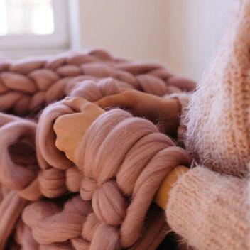 X-Lavoro a maglia con le braccia